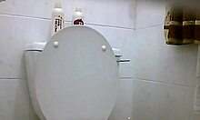 Spycam captures sunbathing beauty on toilet