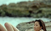 Young brunette's ocean masturbation adventure